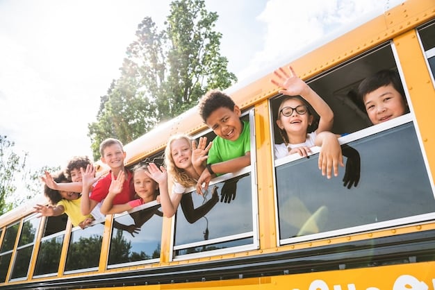 Joyful Children Waving From School Bus